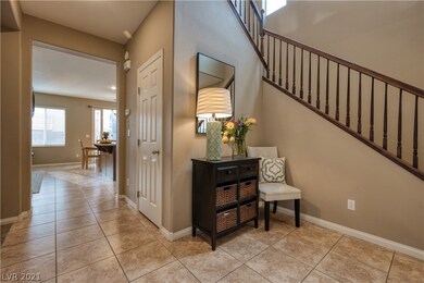 Entry foyer leading to the family room and kitchen