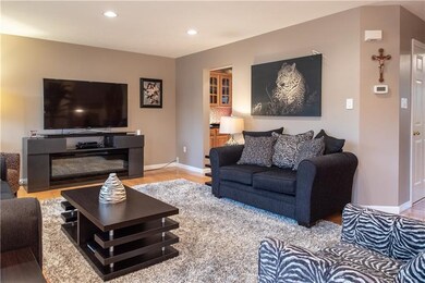 Living room shows off its neutral colors and white