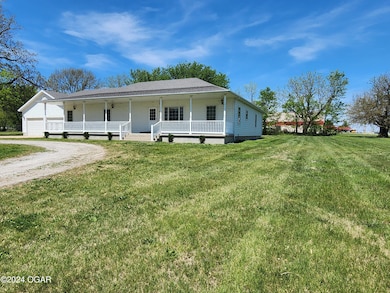 305 E Maple St, Liberal, MO 64762 - photo 2