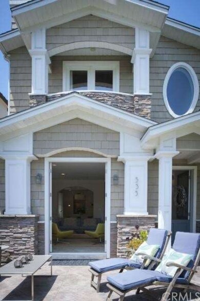 COURTYARD WITH FRENCH DOORS LEADING INTO LIVING RO