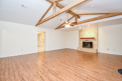 A woodburning, gas fireplace.