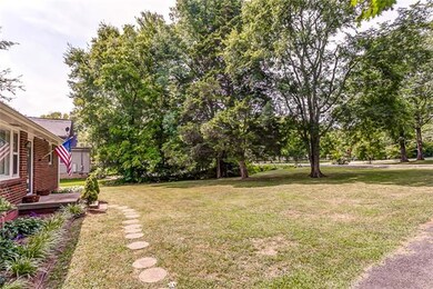 Plenty of room in this front yard for the whole family to get out and play. Wait until you see the backyard. 