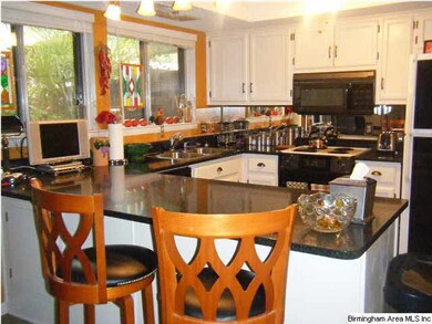 Breakfast bar accommodates bar stools