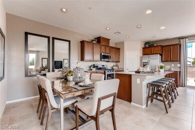 Photo is of model home kitchen and dining room