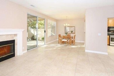 This is another view of the living room and firepl