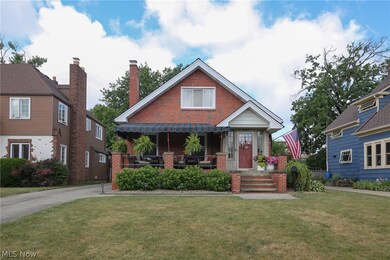 View of front facade with a front yard
