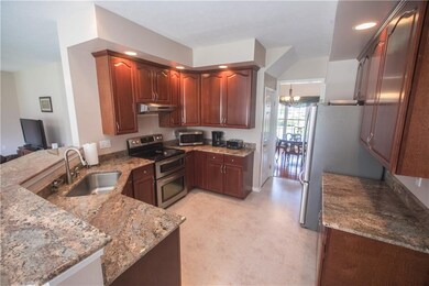 WELL APPOINTED OPEN KITCHEN W/ BREAKFAST BAR * CHE