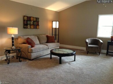 This comfortable and inviting family room is brigh