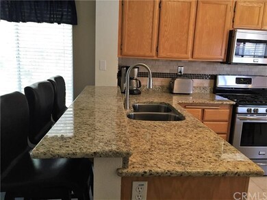 Kitchen breakfast bar plus plenty of cabinet space