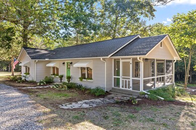 Newly added screened-in side porch