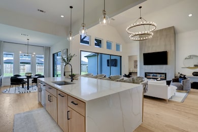 The kitchen over-looking the spacious living area