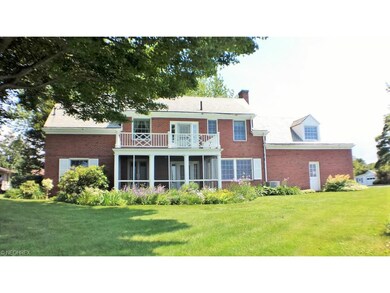 Beautifully landscaped with a screened porch and o