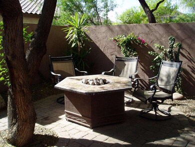 Firepit & seating in front courtyard