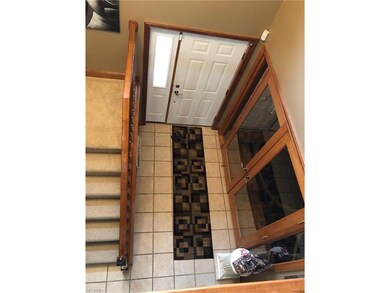 Entrance with French doors to the formal dining