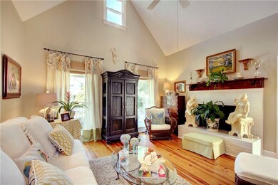 Living Room with Vaulted Ceilings and Wood Burning