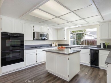 Kitchen with fresh white cabinets, virtually staged.