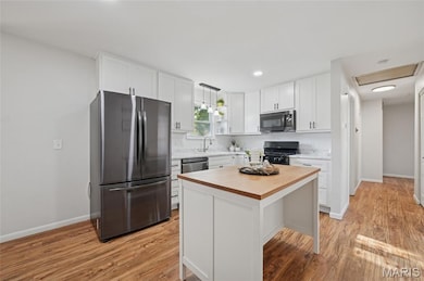 Island has space for bar stool seating.