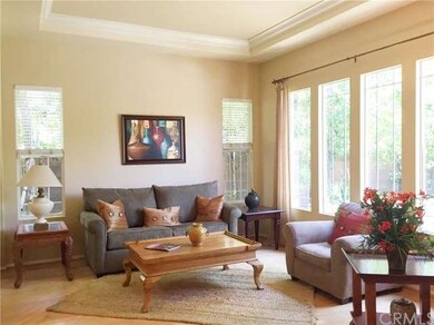 The lovely living room features an impressive wall