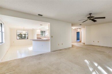 Living room going to dinning area, breakfast count