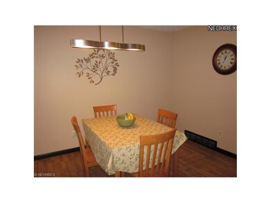 Formal dining room opens to the living room.