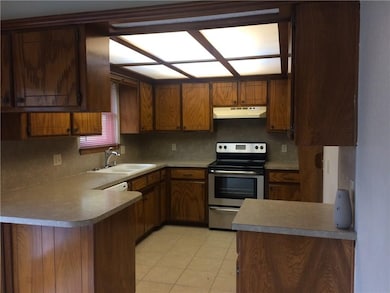 View Of Kitchen From Dining Area. Includes Tile Fl