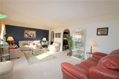 The Living Room is an amazing 20' x 13' with crown