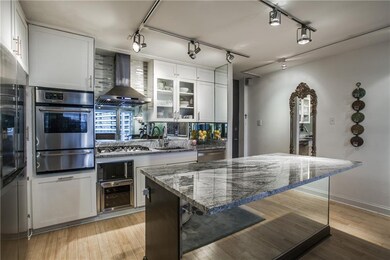 Chef's kitchen with built in microwave and wine co