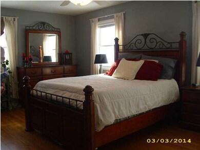 Master bedroom has hardwood floors & double closet