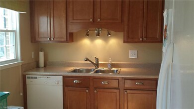 Updated hardware and lighting in kitchen.