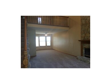 Enjoy a cozy fire while dining in formal dining ro