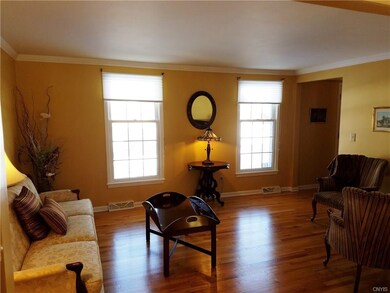 Gleaming hardwoods and lots of light in this brigh