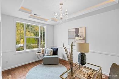 Formal dining/office/bedroom on the main.