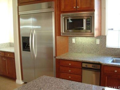 HUGE BUILT IN REFRIGERATER, BUILT IN MICROWAVE AND