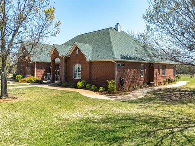 4 bedroom, 3 bathroom brick home