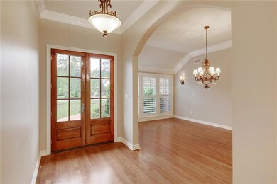 Foyer looking into Formal Dining Room. All wood fl