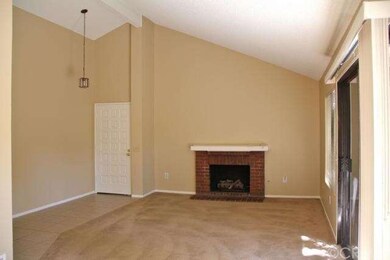 Great big living room with vaulted ceiling and cen