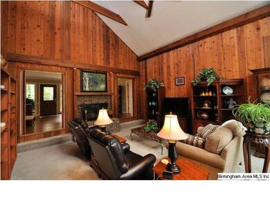 The vaulted ceilings with open beams and a wood bu