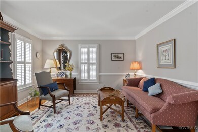 Positioned at the front of the home, the living ro