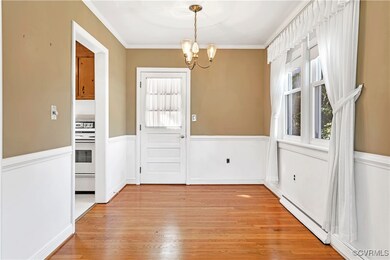 Unfurnished dining area with a baseboard heating u