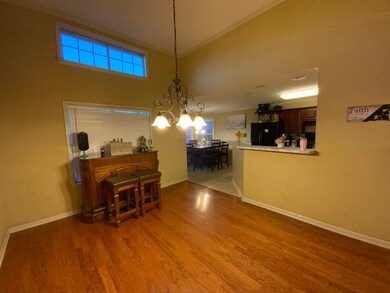 Dining space featuring an inviting chandelier and 