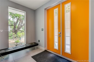 Spacious foyer with natural light.