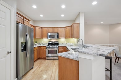 Kitchen w/Snack Bar Open to Great Rm
