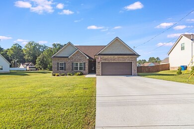 A gorgeous one level partial brick home on a cul-de-sac!