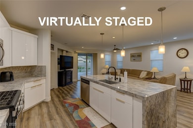 Kitchen featuring stainless steel appliances, wood