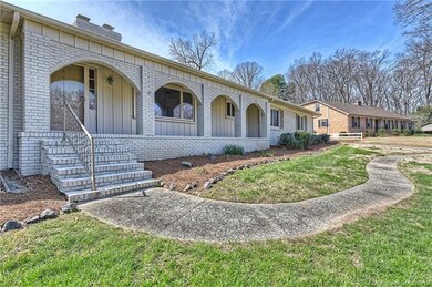 Winding sidewalk leads to the inviting front door!