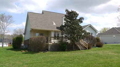 View of the back of the home with a large deck great for entertaining 