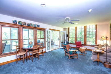 Living Room with French Doors to Porch & Sunny Windows