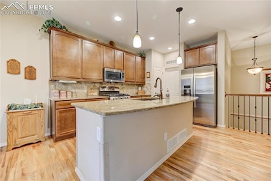 This kitchen is beautifully appointed with solid g