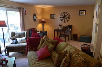 Large Great room looks out to private courtyard patio.
