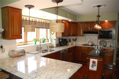 Kitchen with new solid surface counters, backsplas